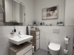 Badezimmer 1 - Charmante barrierefreie 3-Zimmer-Erdgeschosswohnung mit Terrasse in Bargteheide