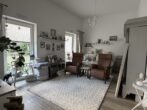 Wohnzimmer - Charmante barrierefreie 3-Zimmer-Erdgeschosswohnung mit Terrasse in Bargteheide